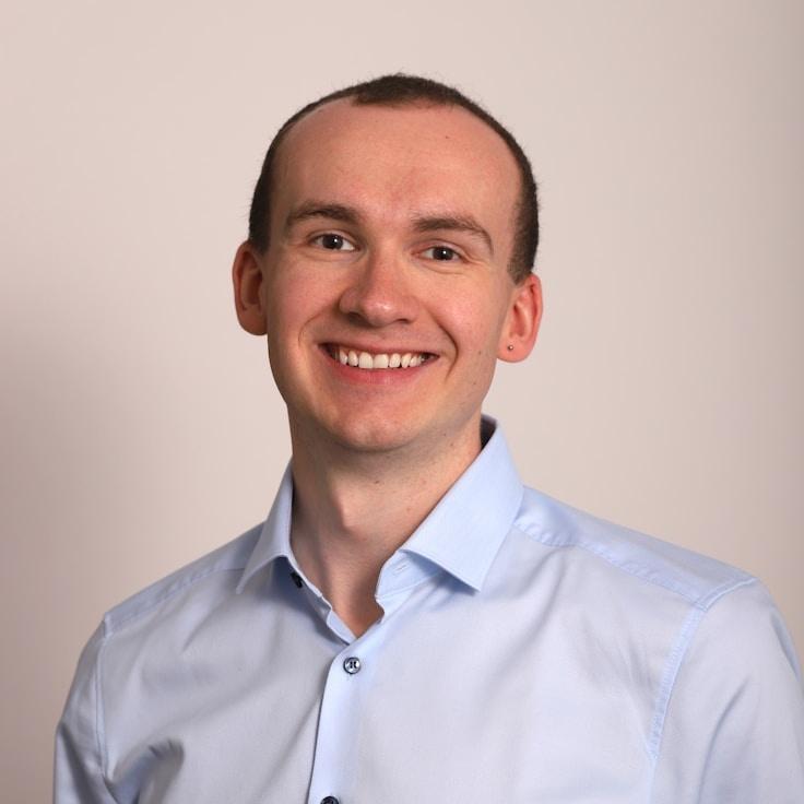 Portrait of Aiden Calder, community mentor and Italian cuisine specialist